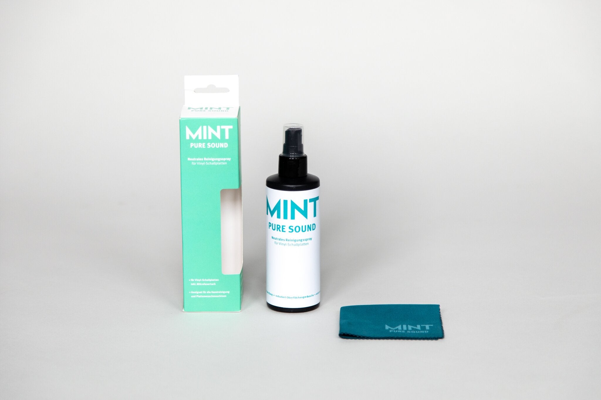 MINT Pure Sound Verpackung, Sprayflasche und Reinigungstuch